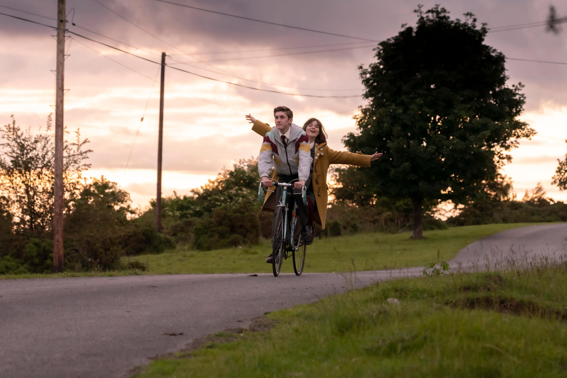 Still of Fionn O'Shea and Lola Petticrew in Dating Amber (2020)