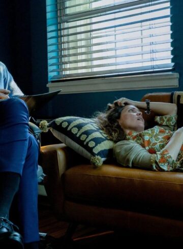 Still of Conan O'Brien and Rose Byrne in If I Had Legs I'd Kick You (2025)